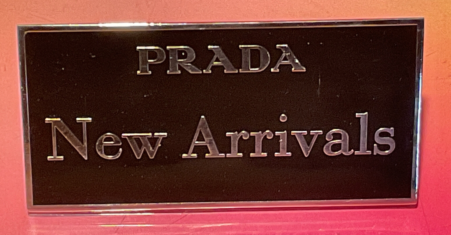 1 PRADA STORE NEW ARRIVALS SIGN SHOW CASE WINDOW TAG ENGRAVED ON STAINLESS STEEL