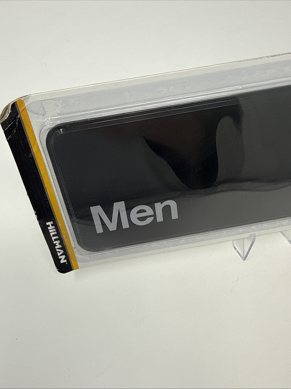 Hillman 841750 Men&rsquo;s Restroom Sign 3&Prime;x9&Prime; Plastic Men Symbol Bathroom Black/White
