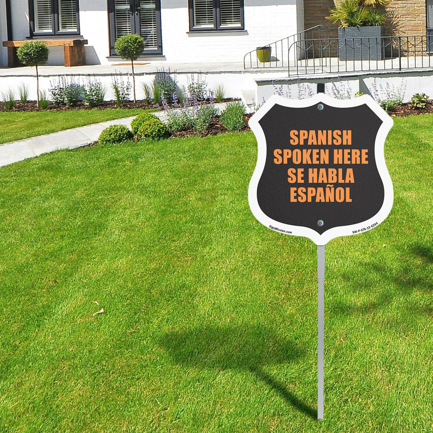 Spanish Spoken Here Bilingual English / Spanish Weather Shield Sign With Stake