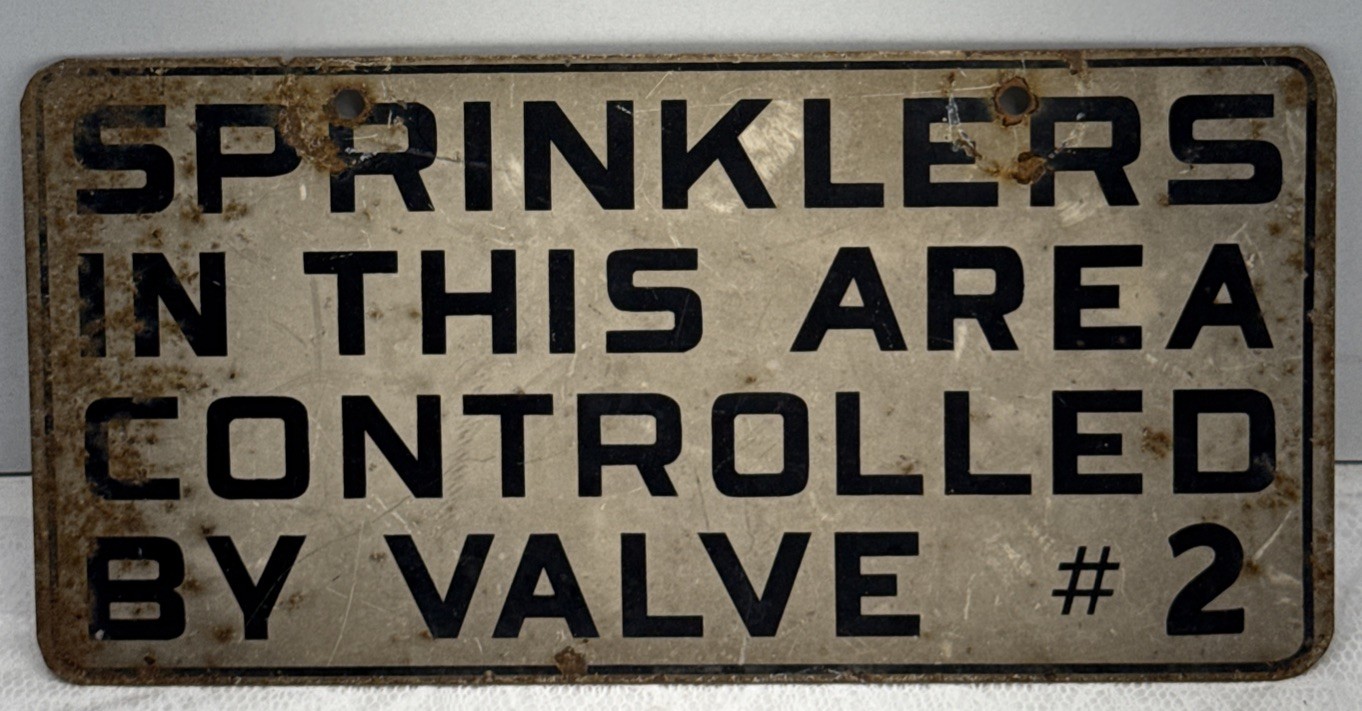 VINTAGE 2 SIDED SPRINKLERS IN THIS AREA CONTROLLED BY VALVE #2 SIGN 12” X6”