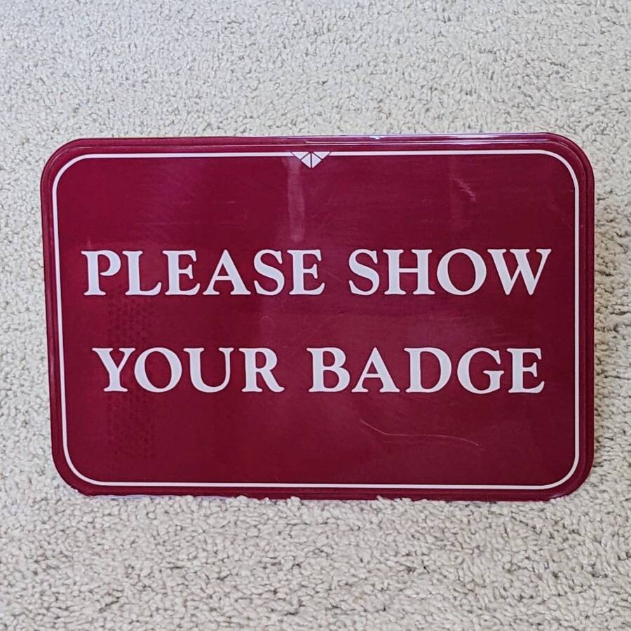 Please Show Your Badge desktop tabletop countertop lobby entrance greeting sign