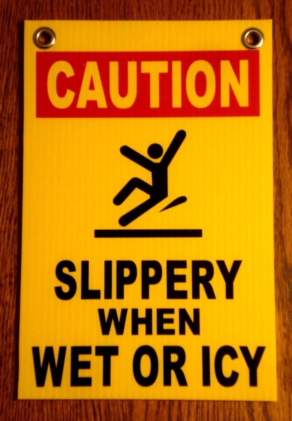 CAUTION -SLIPPERY WHEN WET OR ICY 8&Prime; x12&Prime; Plastic Coroplast Sign w/Grommets y