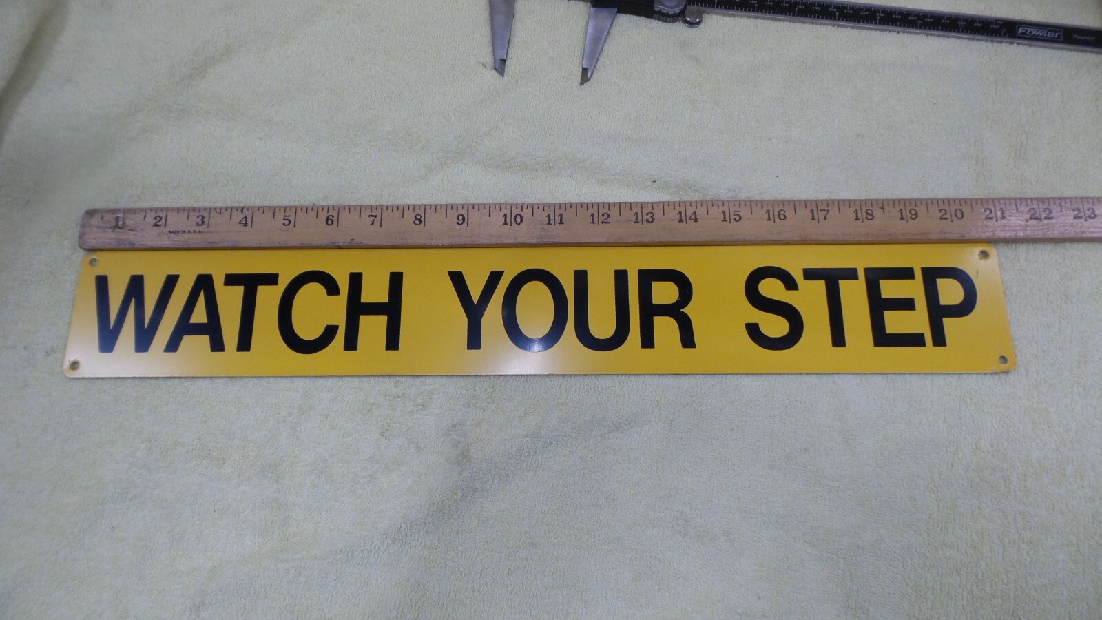 Watch Your Step Sign, Yellow / Black, 3&Prime; x 21&Prime;, 1.9&Prime; Letters, Alum Backing, I2