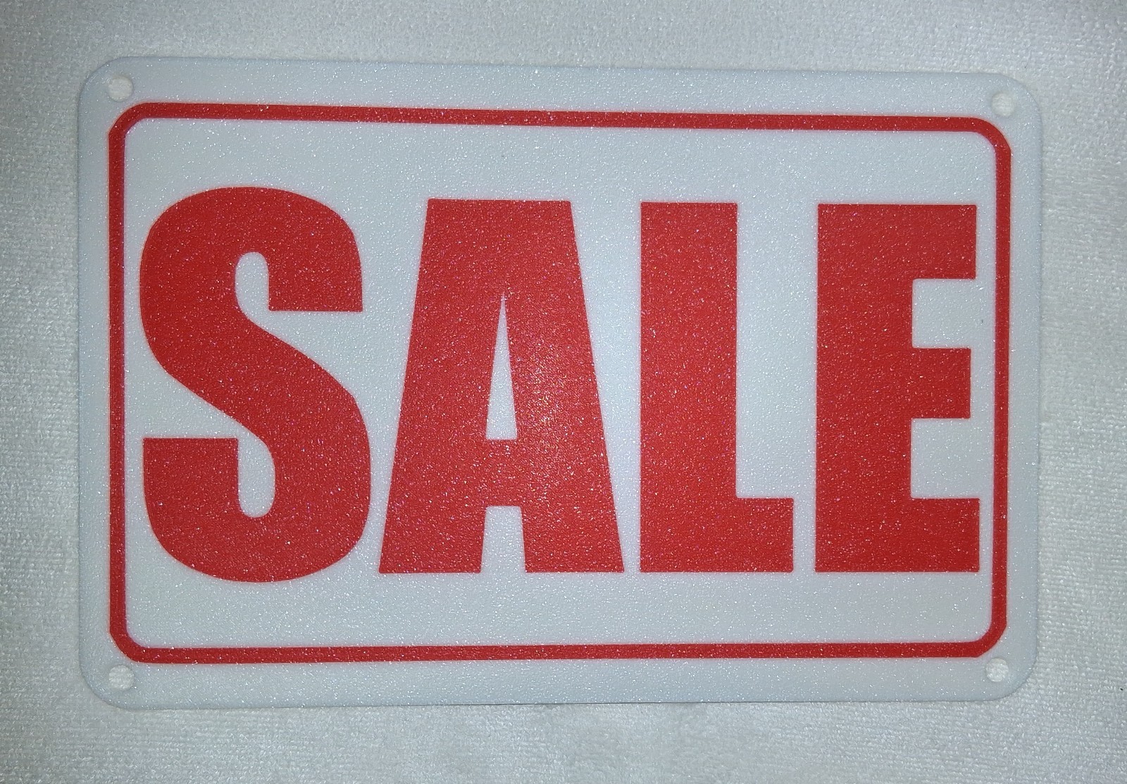 6&Prime; x 9&Prime; SALE Sign. Plastic with mounting holes for screws or « zip ties ».
