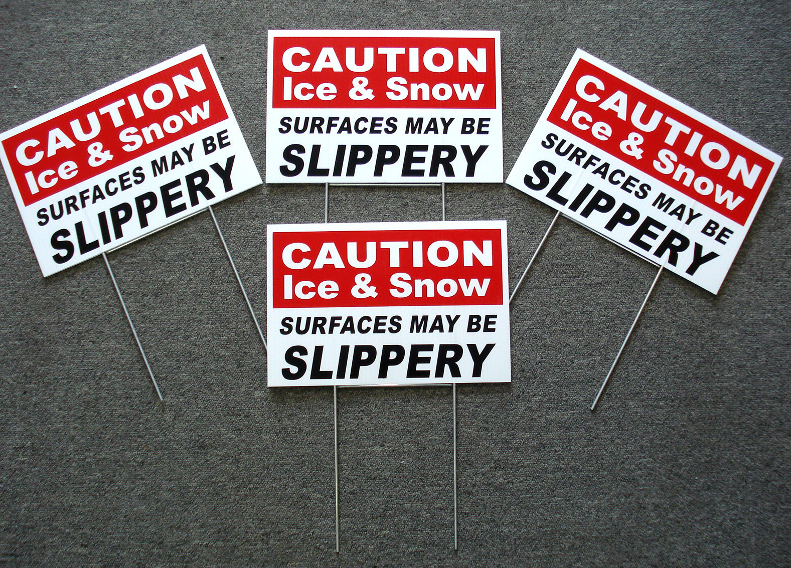 (4) CAUTION – ICE & SNOW SLIPPERY 8&Prime; x12&Prime; Plastic Coroplast Signs with Stakes