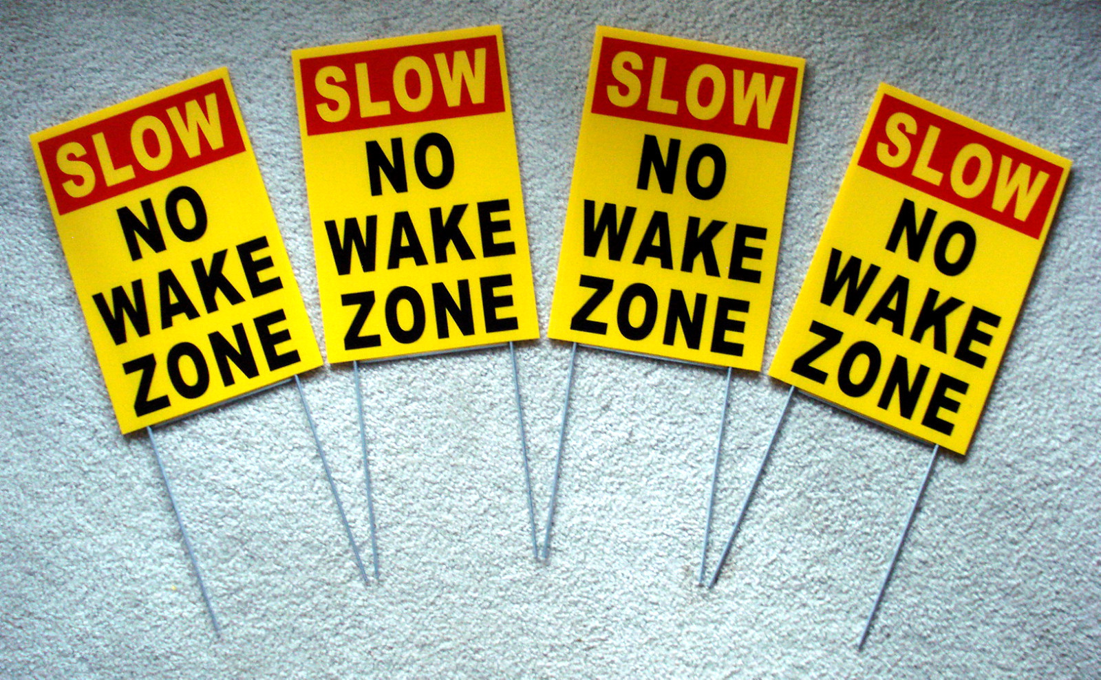 (4) SLOW NO WAKE ZONE 8&Prime; x12&Prime; Plastic Coroplast Signs with Stakes yellow