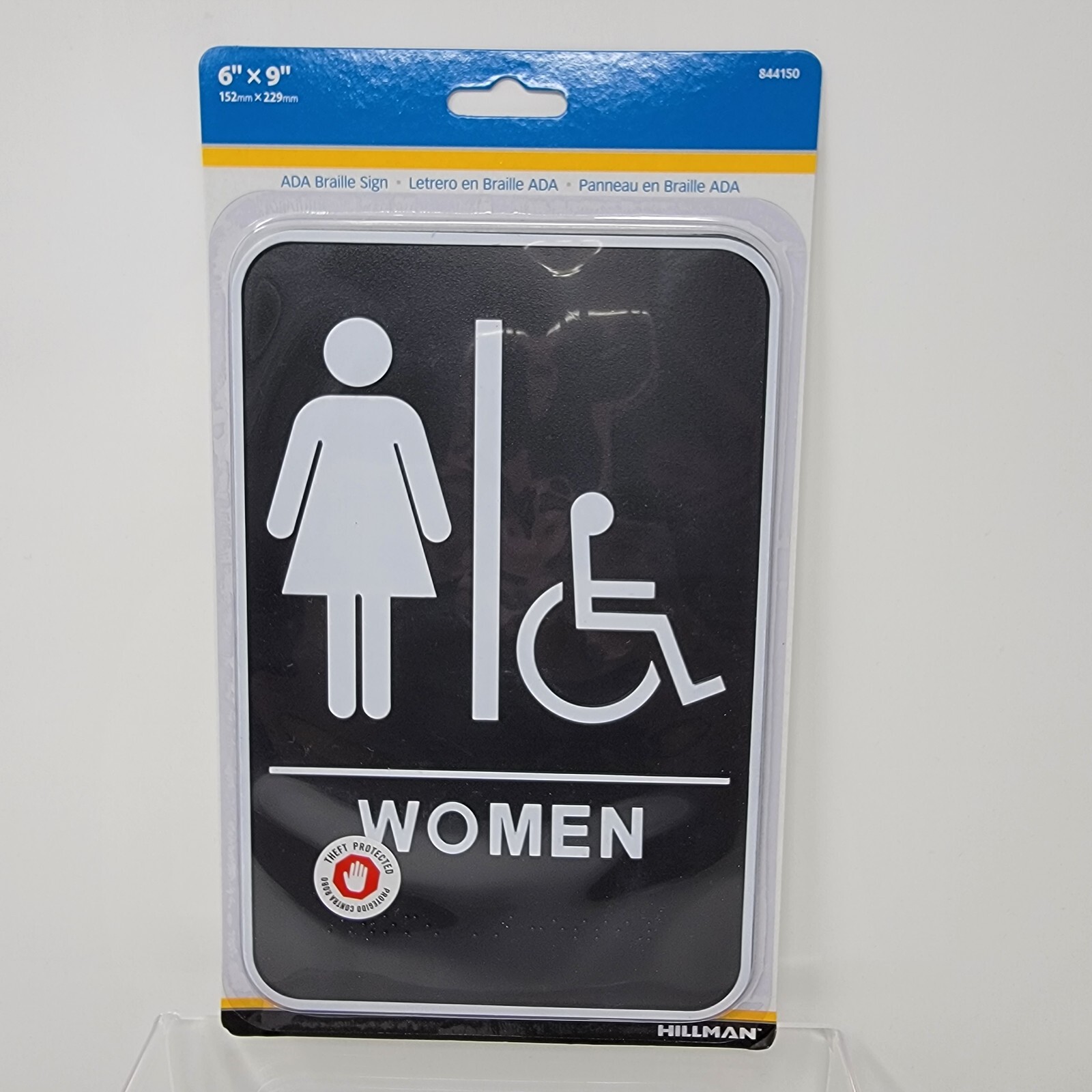 Hillman Group Women Accessible ADA Braille Sign 6&Prime; x 9&Prime; Self Adhesive Plastic