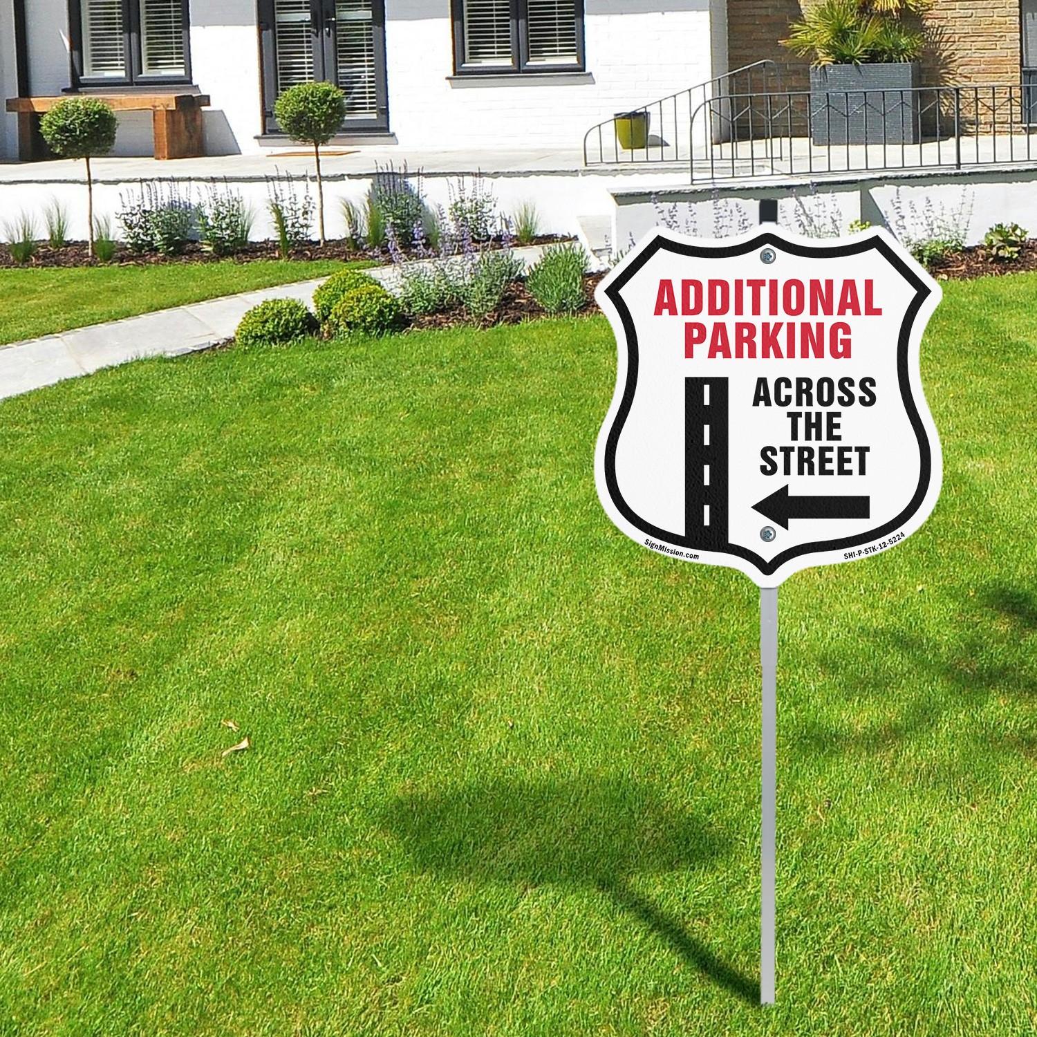 Additional Parking Across Street Left Shield Shaped Sign With Stake