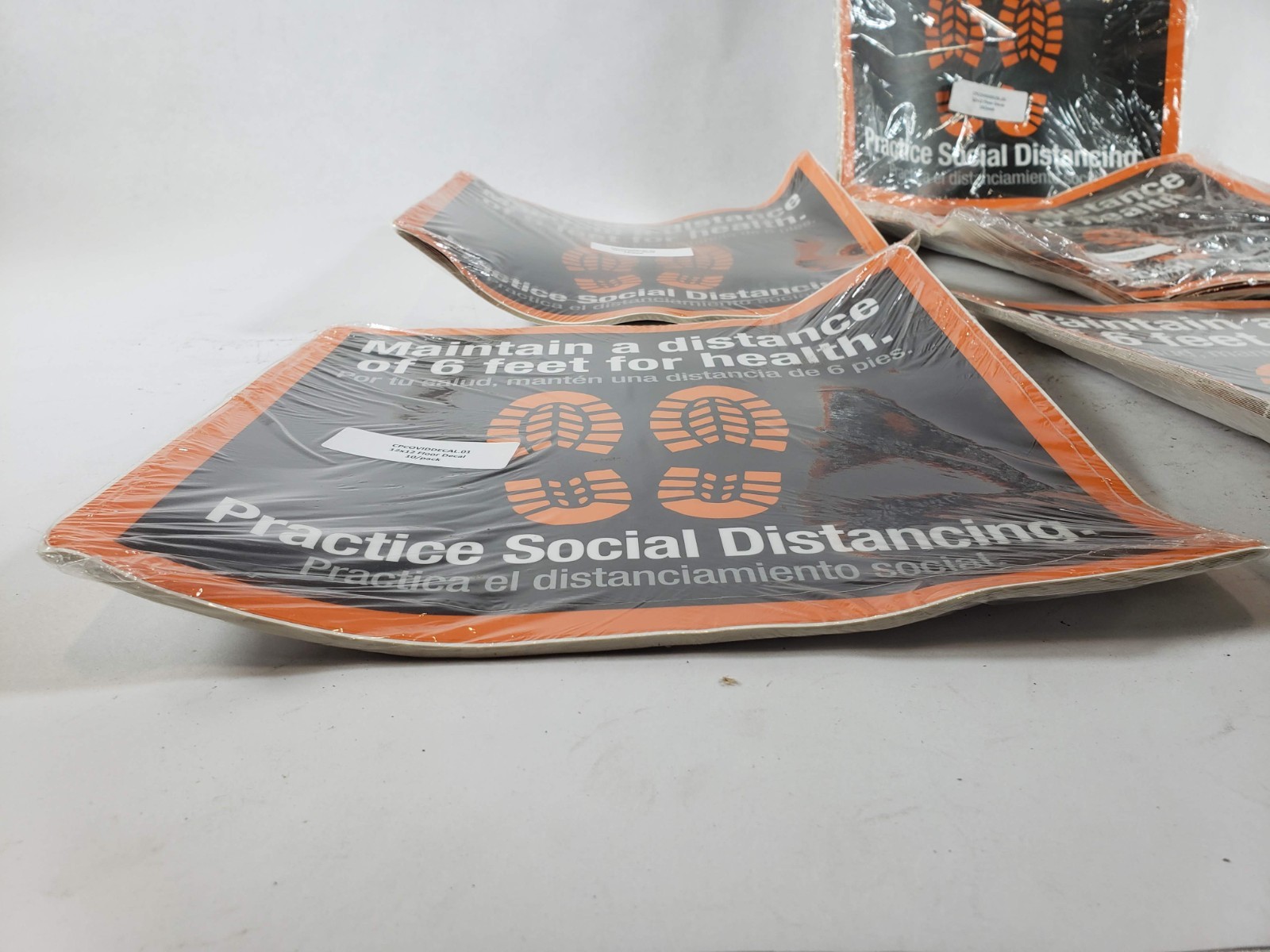 Lot of 70 Social Distancing Floor Signs Decals 12 x 12 in (Bent From Storage)