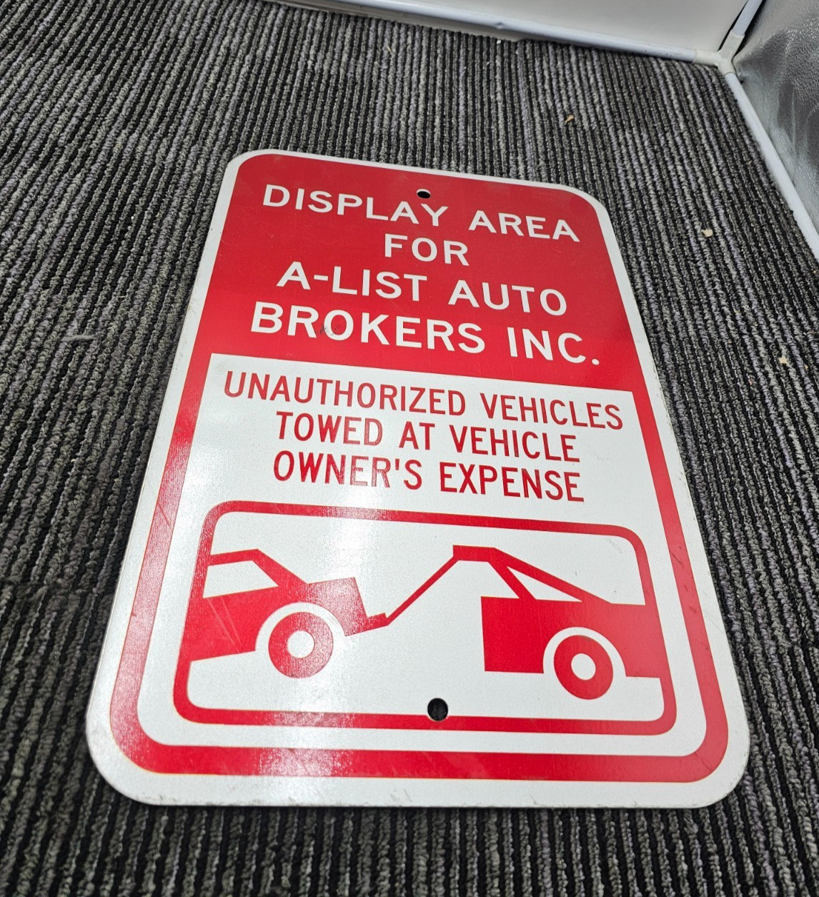 Display Area For A-List Auto Brokers Inc 12 x 18 Unauthorized Vehicle Towed