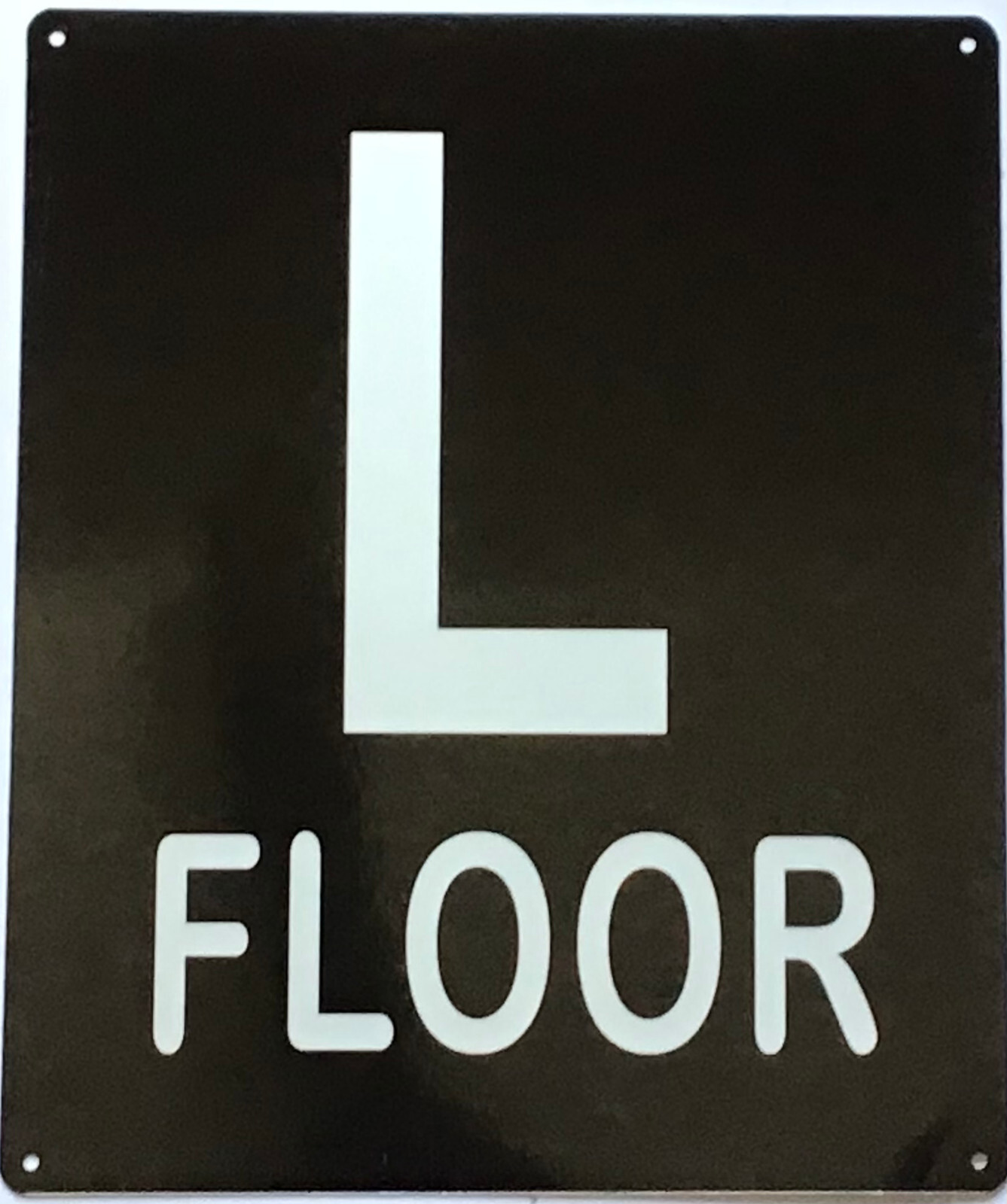 L FLOOR SIGN (10X12, Black Background, Aluminum)