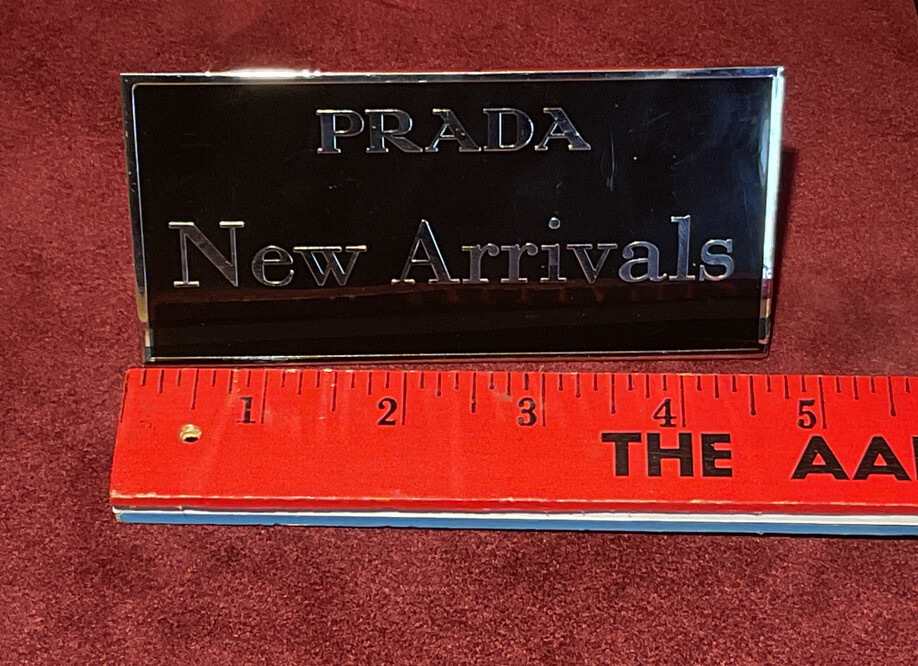 1 PRADA STORE NEW ARRIVALS SIGN SHOW CASE WINDOW TAG ENGRAVED ON STAINLESS STEEL