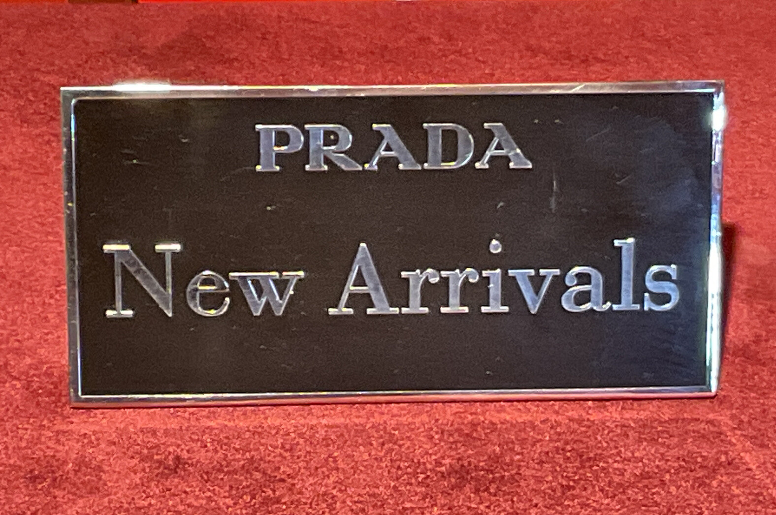 1 PRADA STORE NEW ARRIVALS SIGN SHOW CASE WINDOW TAG ENGRAVED ON STAINLESS STEEL