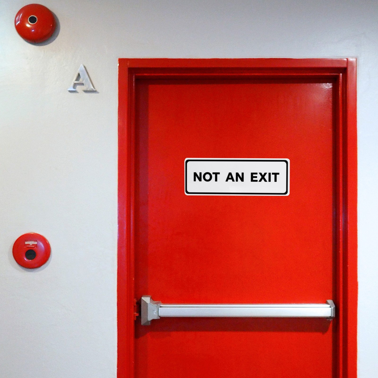 7&Prime;Lx2.5&Prime;Wx0.1&Prime;T Not an Exit Wall or Door Sign, White