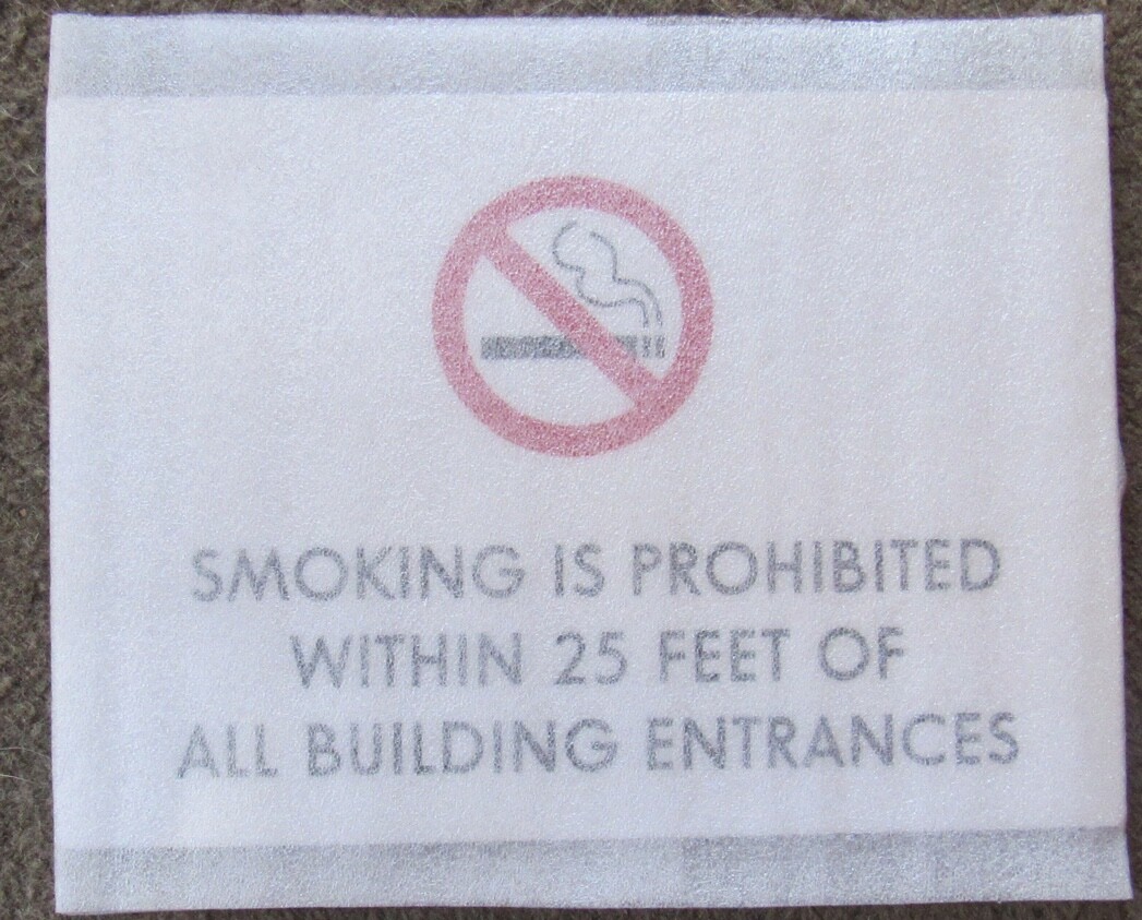 No Smoking Sign White Plastic 7 x 10 inches