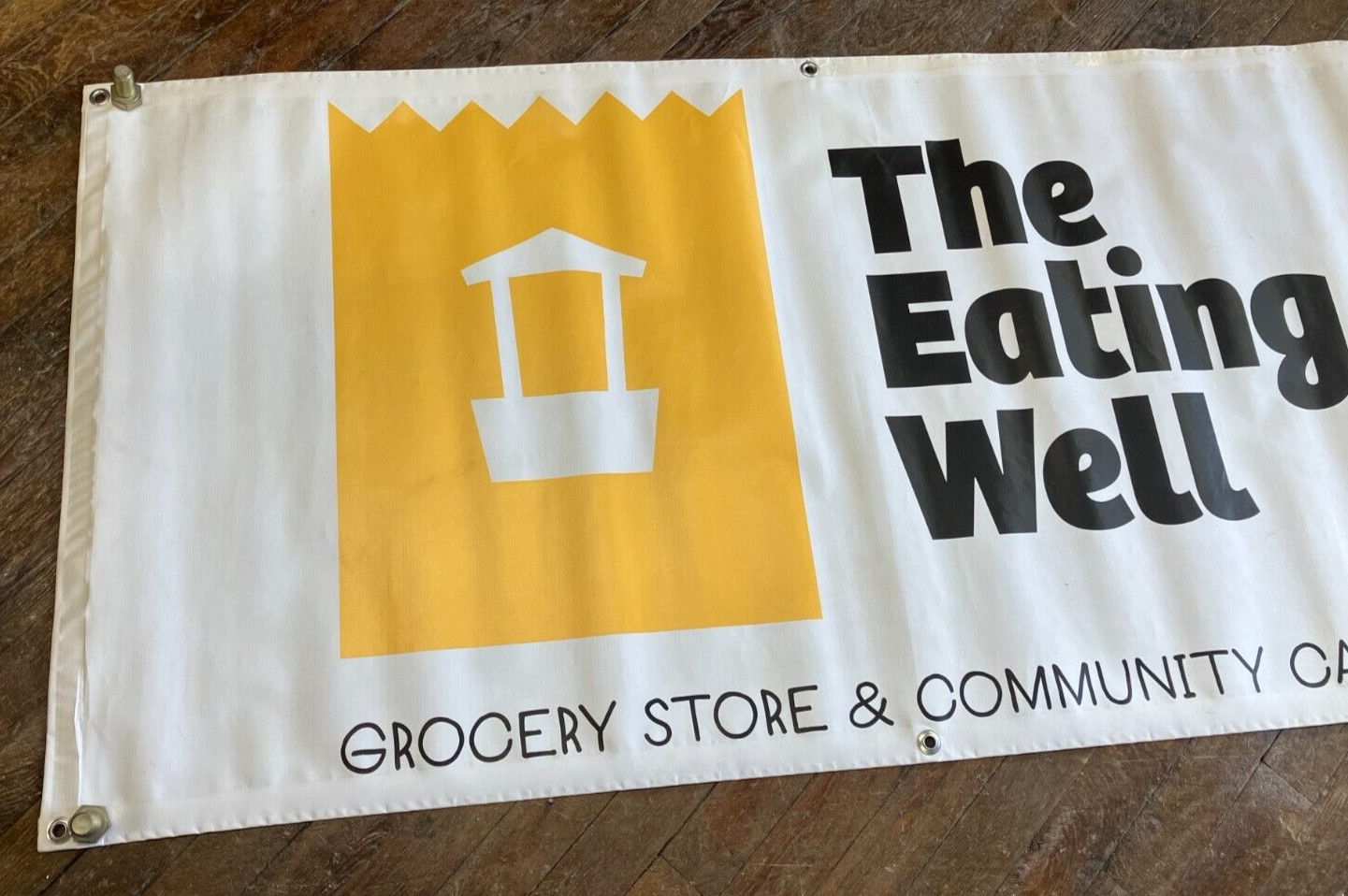 « The Eating Well – Grocery Store & Community Cafe » Vinyl Banner 59&Prime; x 28&Prime;
