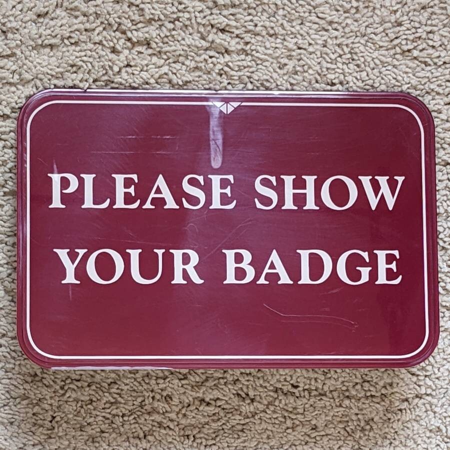Please Show Your Badge desktop tabletop countertop lobby entrance greeting sign