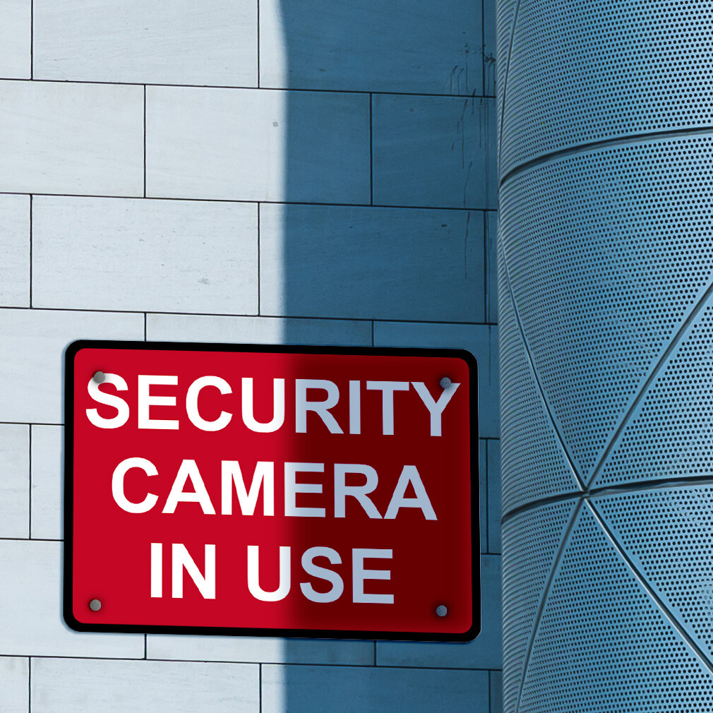 Horizontal Metal Sign Security Camera in Use White on Red Video Surveillance