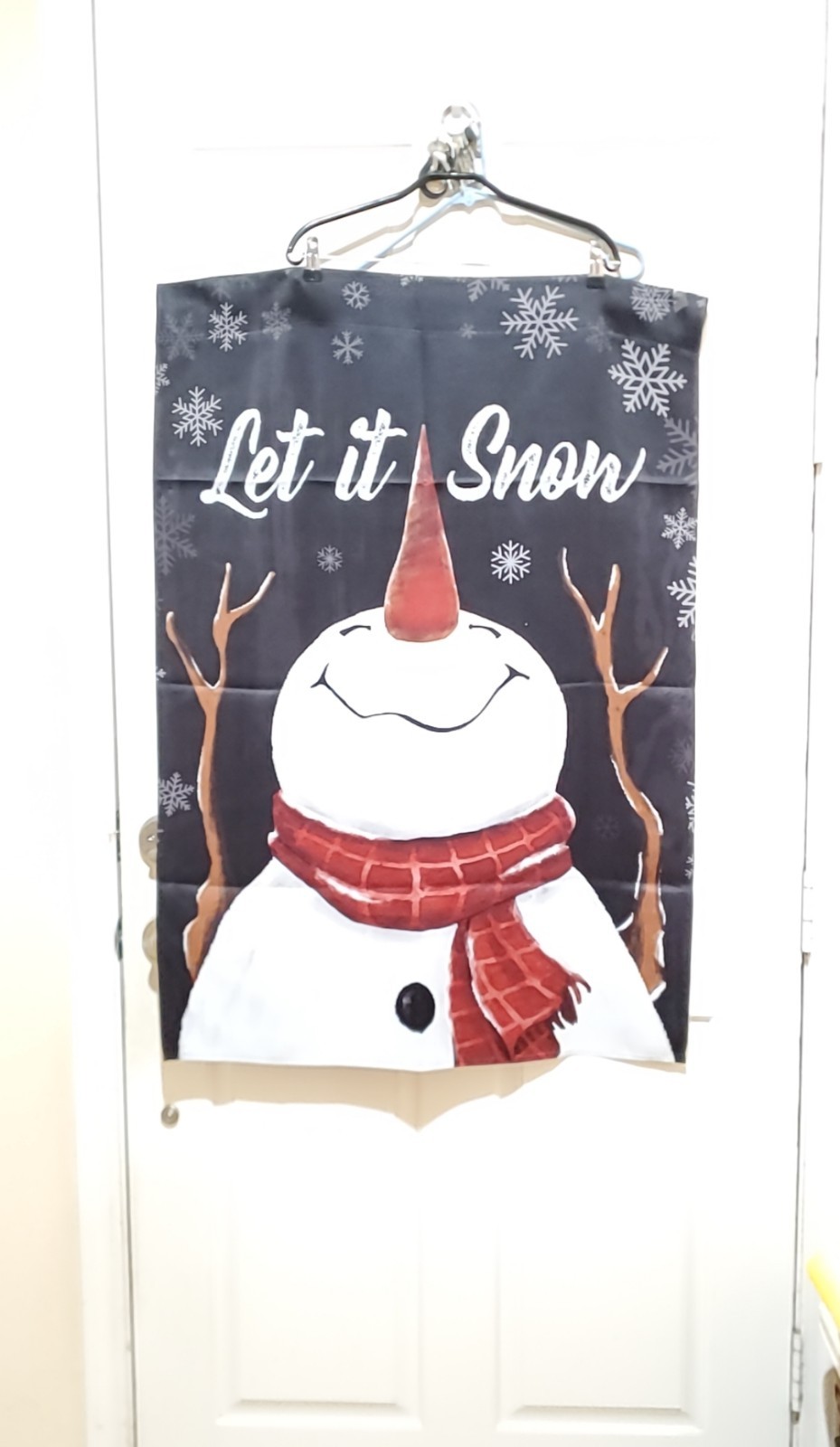 40&Prime;INCHES LONG 28&Prime;INCHES WIDE, LET IT SNOW SAYS THE SNOWMAN CHRISTMAS BANNER.