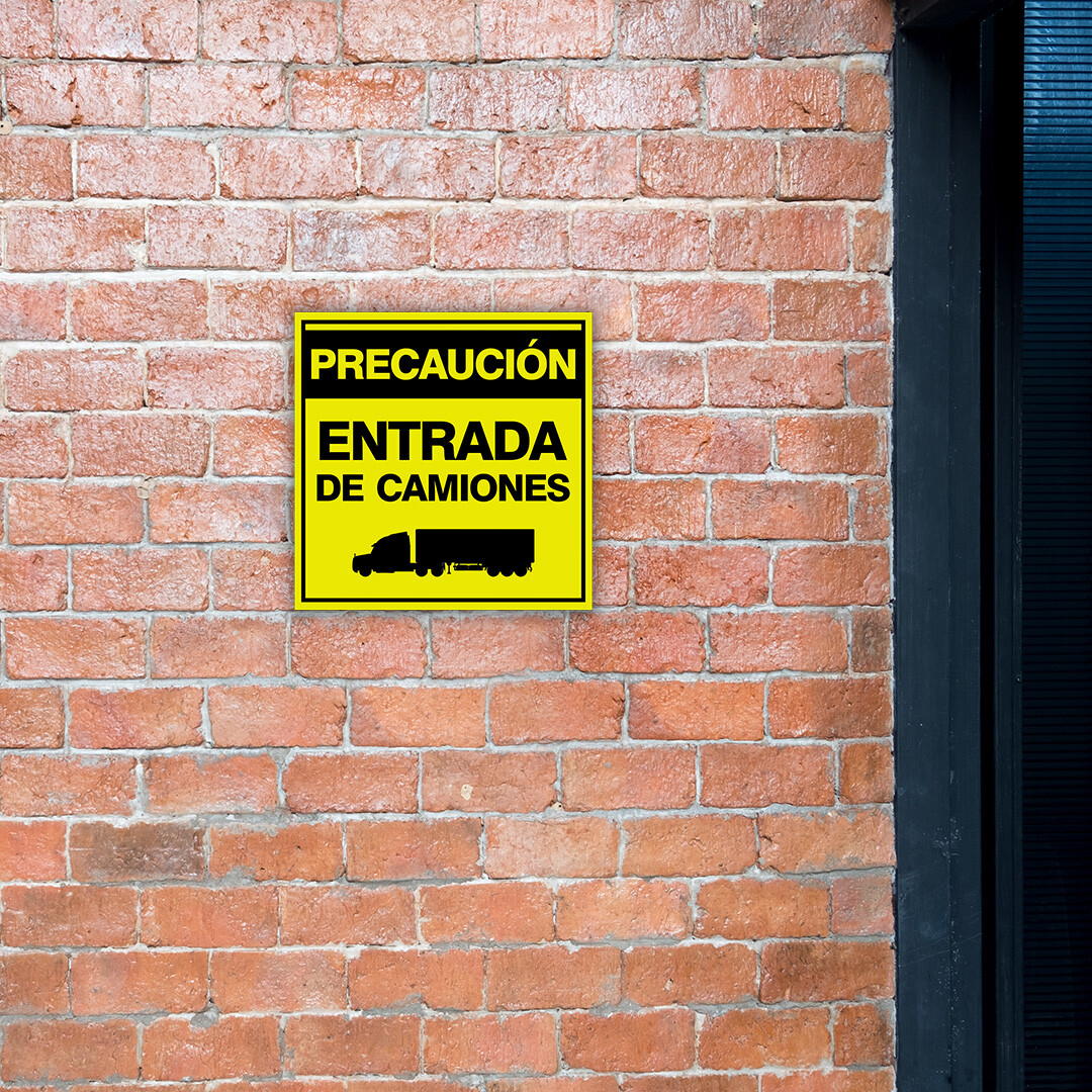 Square Plus Precaución Entrada De Camiones Wall or Door Sign | Spanish | Health