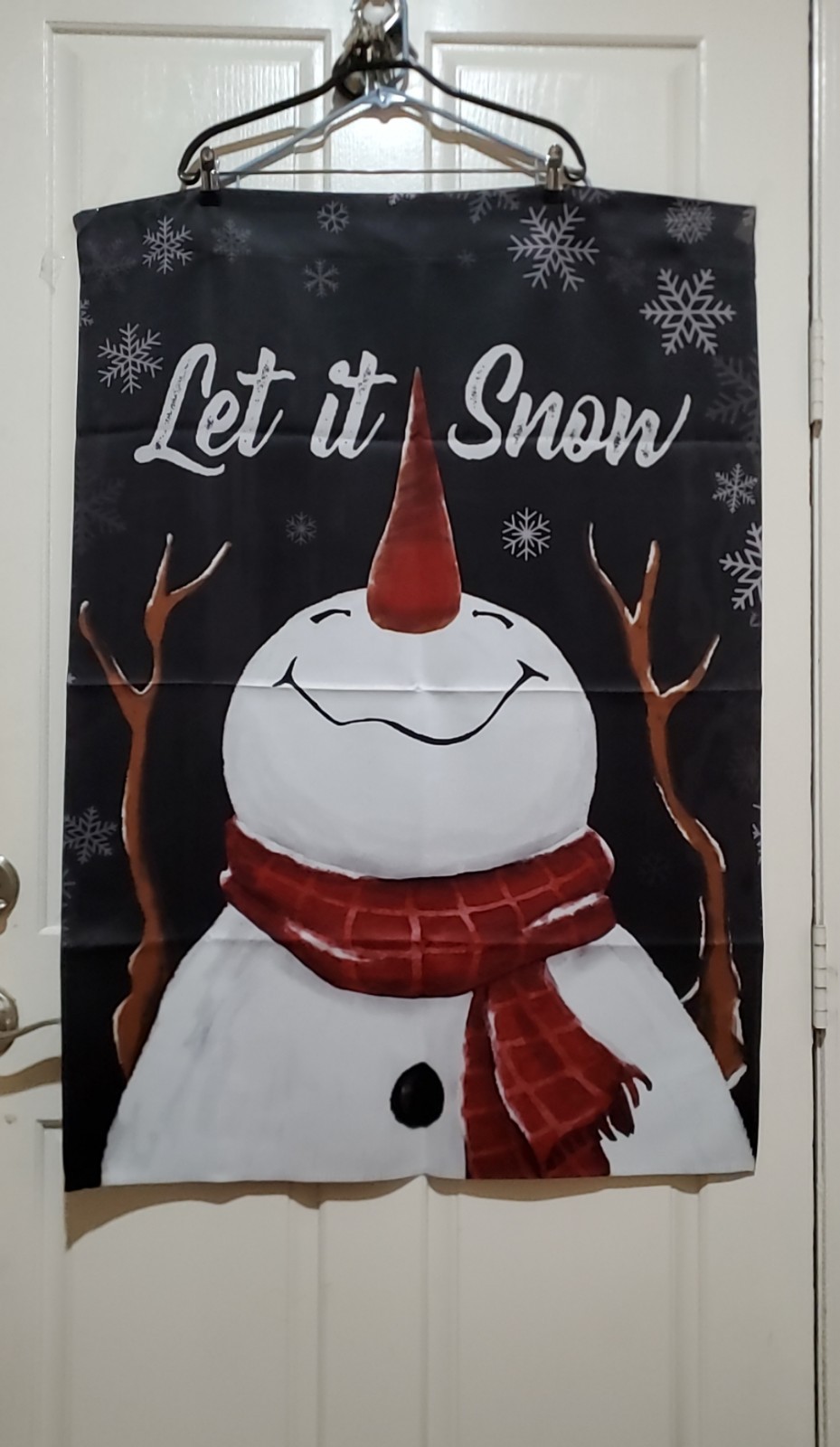 40&Prime;INCHES LONG 28&Prime;INCHES WIDE, LET IT SNOW SAYS THE SNOWMAN CHRISTMAS BANNER.